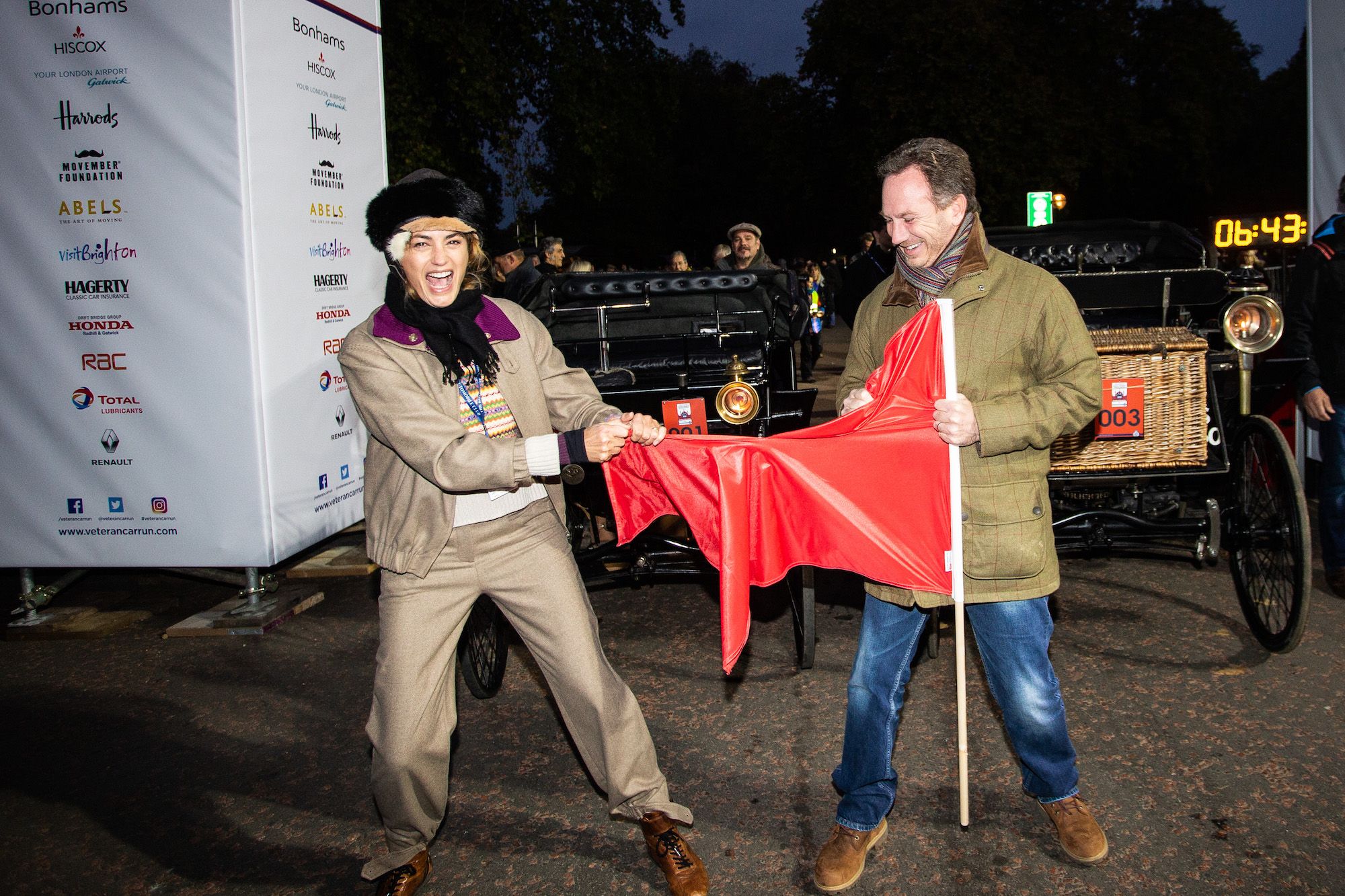 Yasmin LeBon and Christian Horner for the traditional pre-dawn ripping of the red flag ahead of the start in Hyde Park in 2018